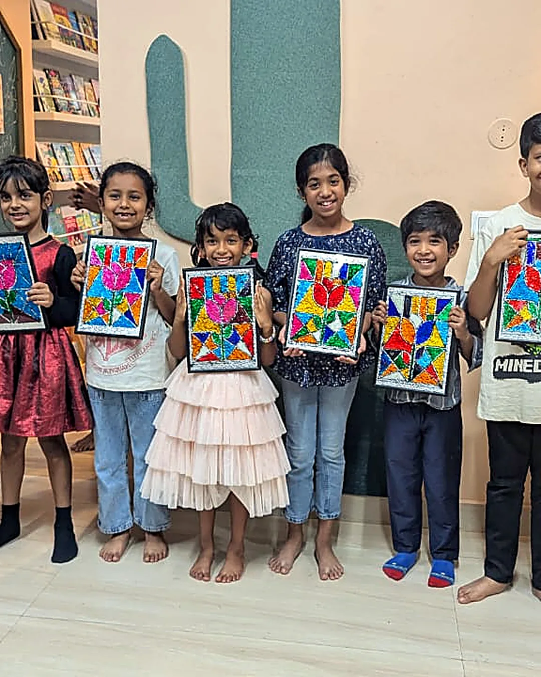 Children showing artwork